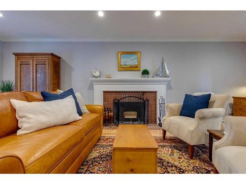 920 Kerfoot Crescent Sw, Calgary, AB - Indoor Photo Showing Living Room With Fireplace