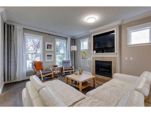 2125 32 Avenue Sw, Calgary, AB - Indoor Photo Showing Living Room With Fireplace