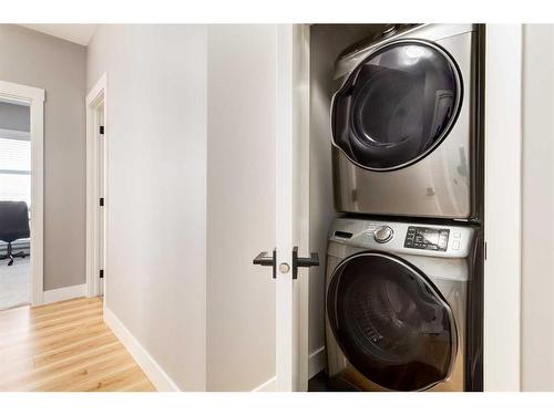 412-19661 40 Street Se, Calgary, AB - Indoor Photo Showing Laundry Room