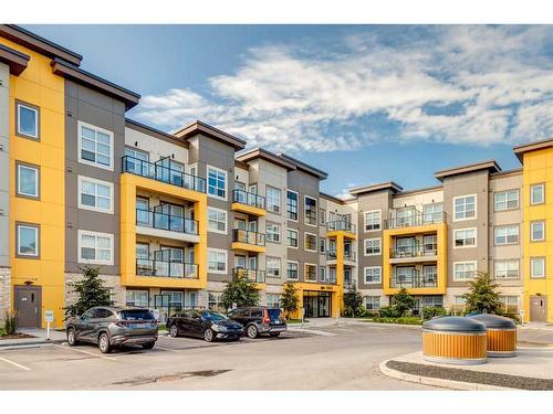 412-19661 40 Street Se, Calgary, AB - Outdoor With Balcony With Facade