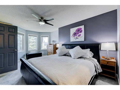 19 Woodside Crescent Nw, Airdrie, AB - Indoor Photo Showing Bedroom