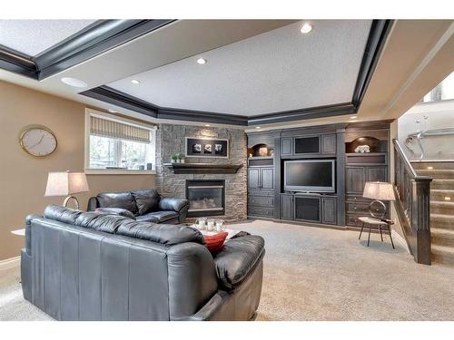 59 Wentwillow Lane Sw, Calgary, AB - Indoor Photo Showing Living Room With Fireplace