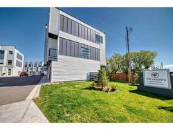 203-101 Panatella Square NW Calgary, AB T3K 2R9