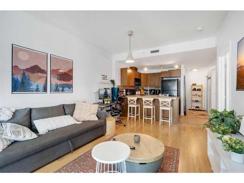 1302-210 15 Avenue Se, Calgary, AB - Indoor Photo Showing Living Room