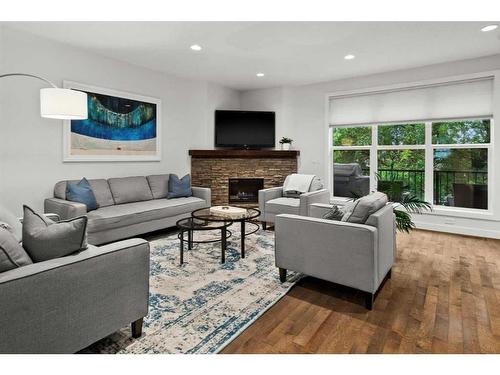 3408 Centre A Street Ne, Calgary, AB - Indoor Photo Showing Living Room With Fireplace