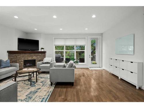 3408 Centre A Street Ne, Calgary, AB - Indoor Photo Showing Living Room With Fireplace