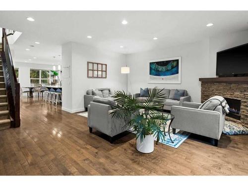 3408 Centre A Street Ne, Calgary, AB - Indoor Photo Showing Living Room With Fireplace