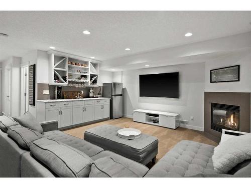 3408 Centre A Street Ne, Calgary, AB - Indoor Photo Showing Living Room With Fireplace