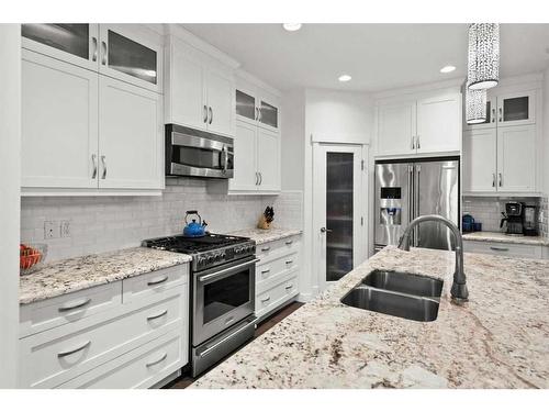 3408 Centre A Street Ne, Calgary, AB - Indoor Photo Showing Kitchen With Stainless Steel Kitchen With Double Sink With Upgraded Kitchen