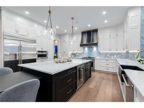 41 Damkar Drive, Rural Rocky View County, AB - Indoor Photo Showing Kitchen With Upgraded Kitchen