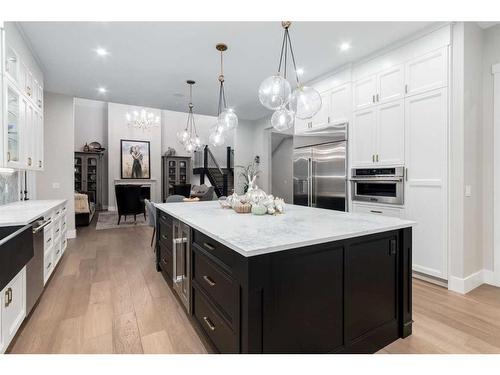 41 Damkar Drive, Rural Rocky View County, AB - Indoor Photo Showing Kitchen With Upgraded Kitchen