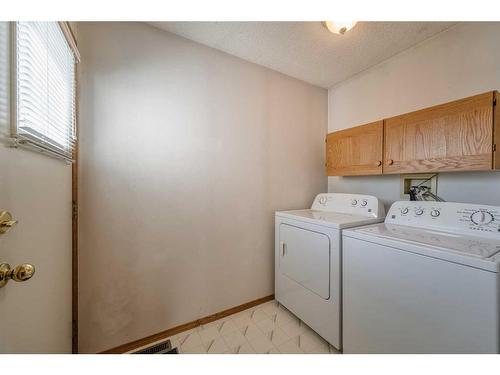 223 Coventry Close Ne, Calgary, AB - Indoor Photo Showing Laundry Room