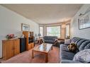 223 Coventry Close Ne, Calgary, AB  - Indoor Photo Showing Living Room 