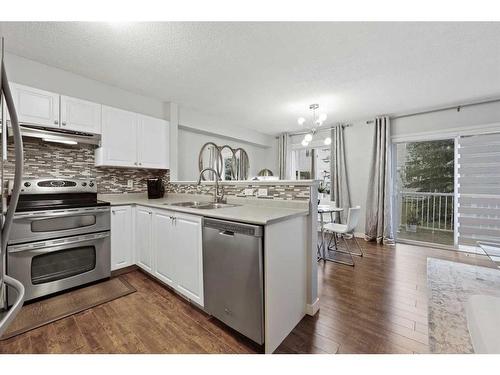 7 Citadel Meadow Gardens Nw, Calgary, AB - Indoor Photo Showing Kitchen With Stainless Steel Kitchen With Double Sink With Upgraded Kitchen