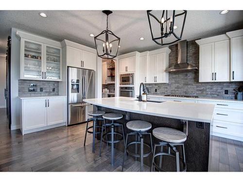 149 Kingsmere Cove Se, Airdrie, AB - Indoor Photo Showing Kitchen With Upgraded Kitchen