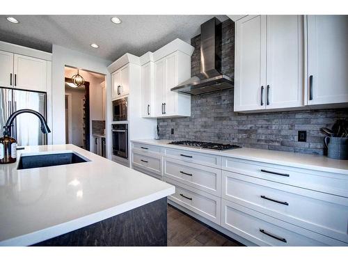 149 Kingsmere Cove Se, Airdrie, AB - Indoor Photo Showing Kitchen With Upgraded Kitchen