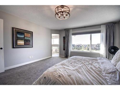 149 Kingsmere Cove Se, Airdrie, AB - Indoor Photo Showing Bedroom