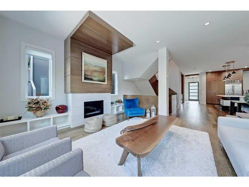 1722 47 Avenue Sw, Calgary, AB - Indoor Photo Showing Living Room With Fireplace