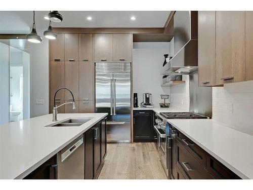 1722 47 Avenue Sw, Calgary, AB - Indoor Photo Showing Kitchen With Double Sink With Upgraded Kitchen