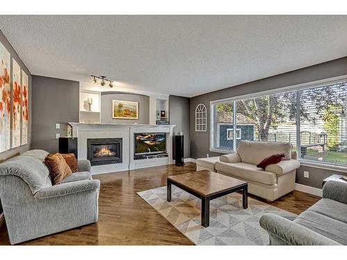 38 Inverness Rise Se, Calgary, AB - Indoor Photo Showing Living Room With Fireplace