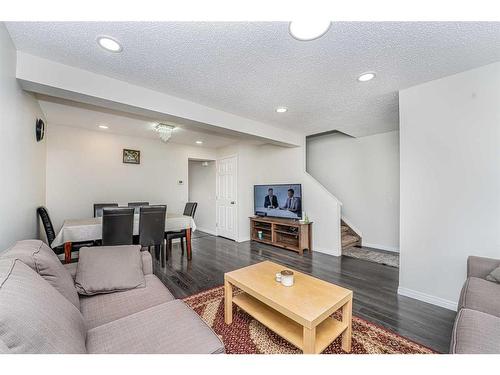 369 Falshire Drive Ne, Calgary, AB - Indoor Photo Showing Living Room