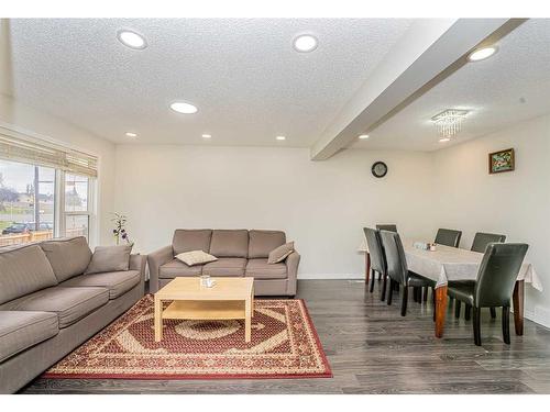 369 Falshire Drive Ne, Calgary, AB - Indoor Photo Showing Living Room