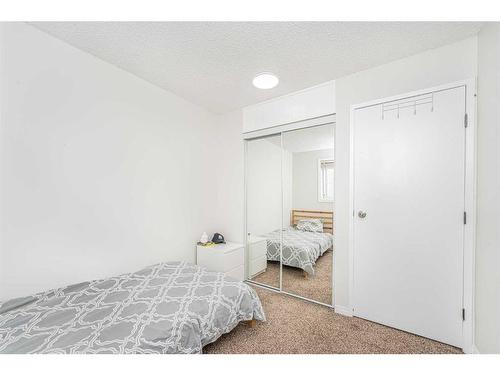 369 Falshire Drive Ne, Calgary, AB - Indoor Photo Showing Bedroom