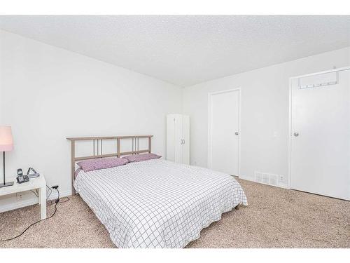 369 Falshire Drive Ne, Calgary, AB - Indoor Photo Showing Bedroom