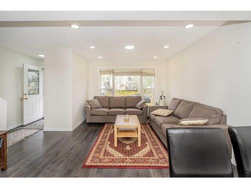 369 Falshire Drive Ne, Calgary, AB - Indoor Photo Showing Living Room