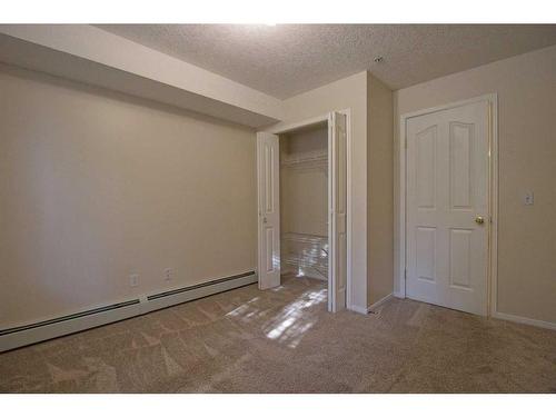 101-3000 Somervale Court Sw, Calgary, AB - Indoor Photo Showing Other Room