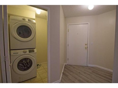 101-3000 Somervale Court Sw, Calgary, AB - Indoor Photo Showing Laundry Room