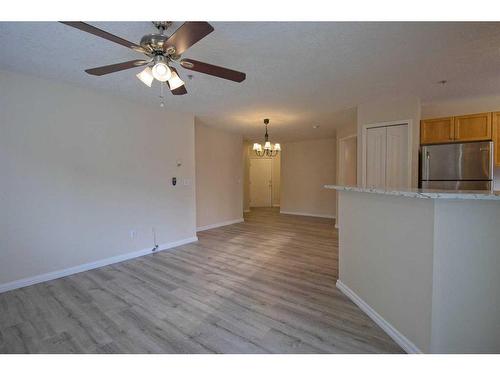 101-3000 Somervale Court Sw, Calgary, AB - Indoor Photo Showing Kitchen