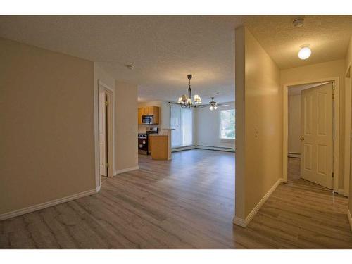 101-3000 Somervale Court Sw, Calgary, AB - Indoor Photo Showing Other Room