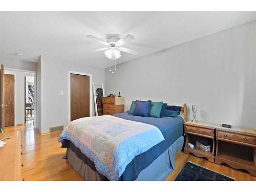 107 Palis Way Sw, Calgary, AB - Indoor Photo Showing Bedroom