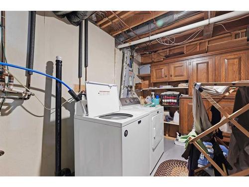 107 Palis Way Sw, Calgary, AB - Indoor Photo Showing Laundry Room