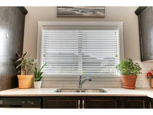 1338 Legacy Circle Se, Calgary, AB - Indoor Photo Showing Kitchen With Double Sink