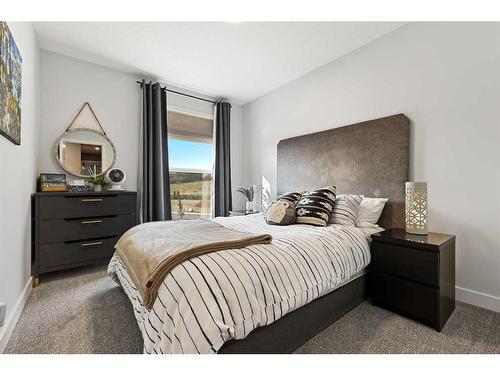 138 Wolf Creek Rise Se, Calgary, AB - Indoor Photo Showing Bedroom