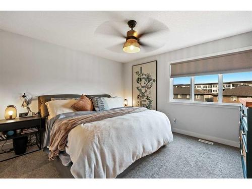 138 Wolf Creek Rise Se, Calgary, AB - Indoor Photo Showing Bedroom