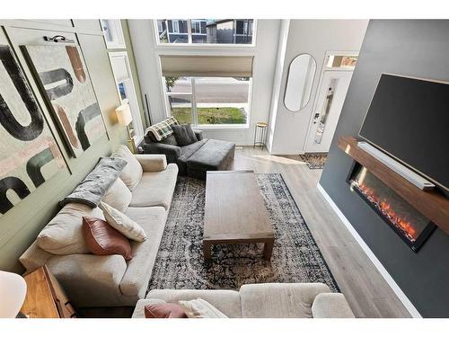 138 Wolf Creek Rise Se, Calgary, AB - Indoor Photo Showing Living Room With Fireplace