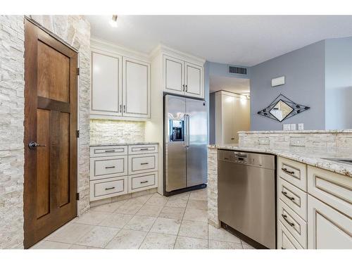 404-837 2 Avenue Sw, Calgary, AB - Indoor Photo Showing Kitchen With Stainless Steel Kitchen