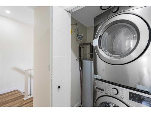 308-156 Park Street, Cochrane, AB - Indoor Photo Showing Laundry Room