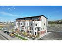 308-156 Park Street, Cochrane, AB  - Outdoor 