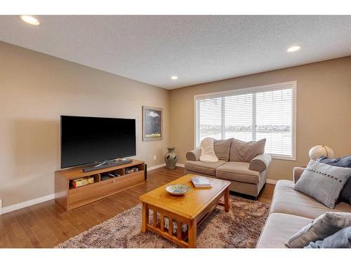 291 Reunion Green Nw, Airdrie, AB - Indoor Photo Showing Living Room