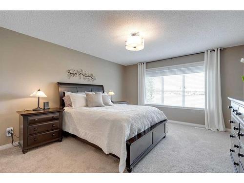 291 Reunion Green Nw, Airdrie, AB - Indoor Photo Showing Bedroom