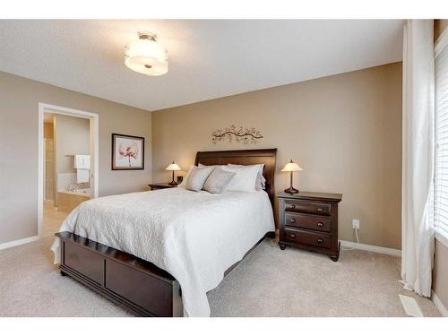 291 Reunion Green Nw, Airdrie, AB - Indoor Photo Showing Bedroom