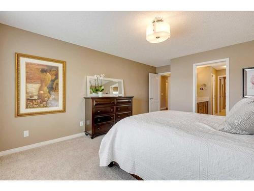 291 Reunion Green Nw, Airdrie, AB - Indoor Photo Showing Bedroom