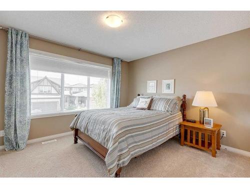 291 Reunion Green Nw, Airdrie, AB - Indoor Photo Showing Bedroom