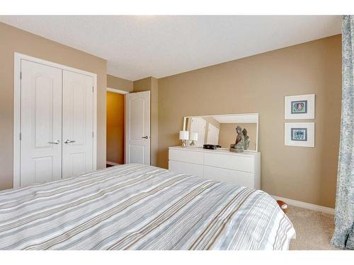 291 Reunion Green Nw, Airdrie, AB - Indoor Photo Showing Bedroom