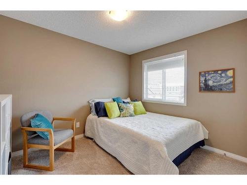 291 Reunion Green Nw, Airdrie, AB - Indoor Photo Showing Bedroom