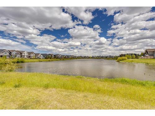 291 Reunion Green Nw, Airdrie, AB - Outdoor With Body Of Water With View